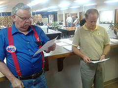 Hall and Page examining precinct results