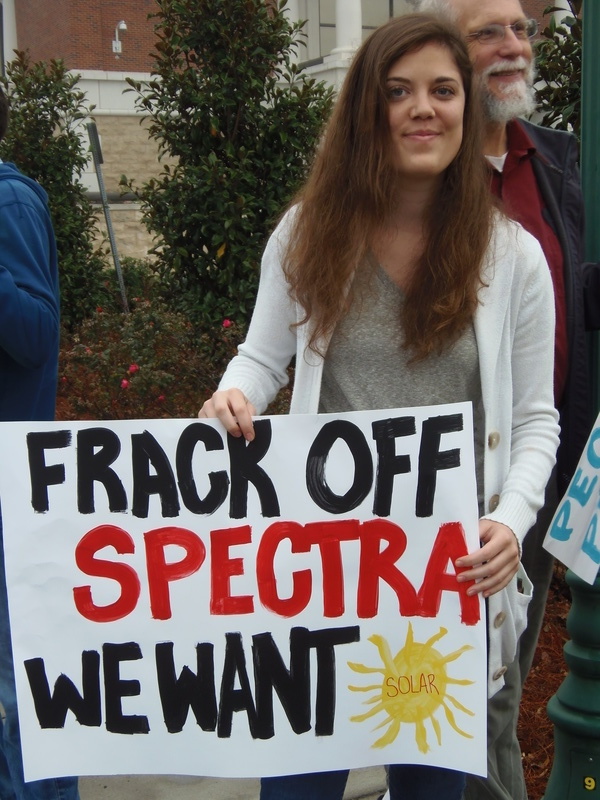 Frack Off Spectra, We Want Solar: Danielle Jordan, President of S.A.V.E., in No pipeline no fracking: protest before Spectra at Lowndes County Commission, by Gretchen Quarterman, for Lowndes Area Knowledge Exchange (LAKE), 9 December 2013