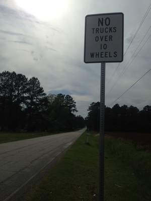 Sign on each end of road