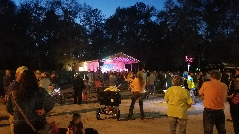 1008x567 Strollers and a stage, Dusk, in Friday, Suwannee Spring Reunion, by John S. Quarterman, 24 March 2017
