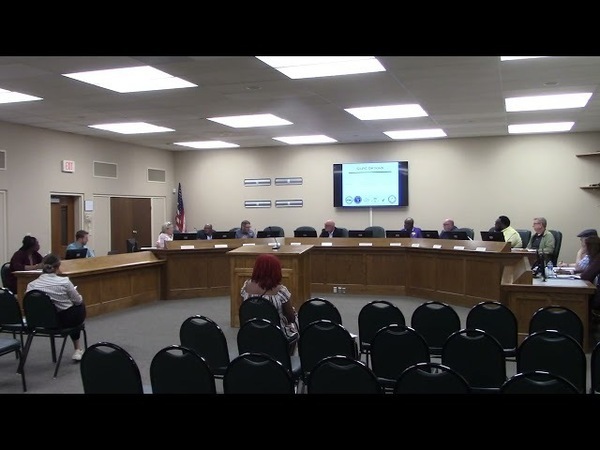 Commissioner Touchton recused himself on REZ-2026-13