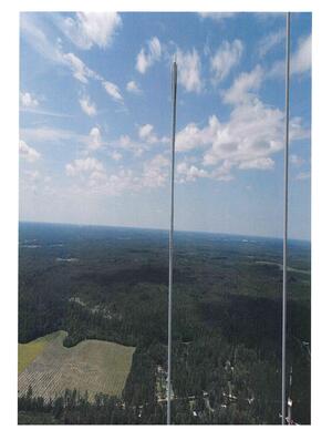 [Page 39: unlabeled tower photograph]