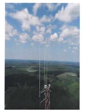 [Page 40: unlabeled tower photograph]
