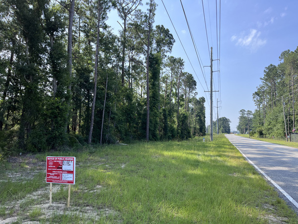 [Notice sign across from 3671 Coleman Road N]
