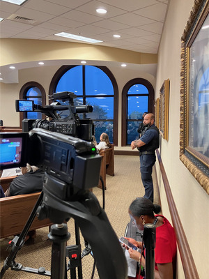 [TV Camera and Sheriff Deputies @ LCC Regular Session, 2026-08-25 --Gretchen Quarterman for LAKE]