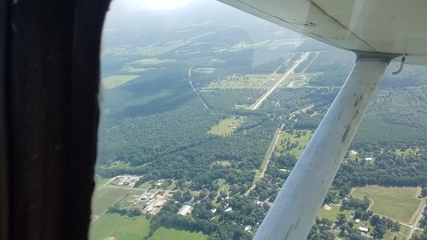 ENE across Tiger Field, Pritchett mine site on left, 10:25:55, 29.9275159, -82.4320183