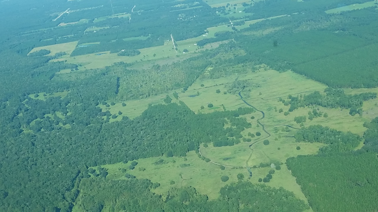 W from New River across Howard mine site, Five Mile Creek, SW 48th Path, CR 18A, Flying Tiger Field upper left, 09:53:40, 29.946217, -82.347775