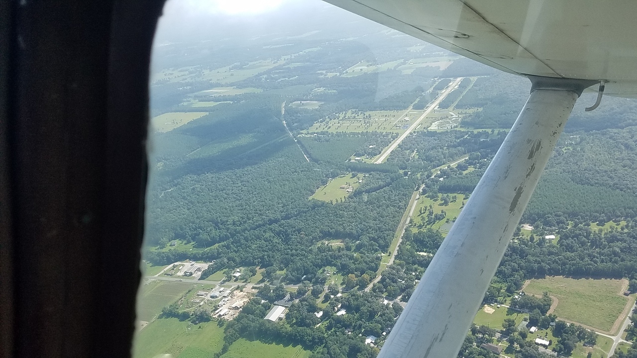 ENE across Tiger Field, Pritchett mine site on left, 10:25:55, 29.9275159, -82.4320183