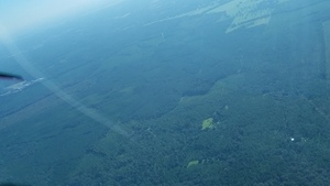 [N from New River across mine site: l. New River P. r. Beasley; left center prison; top left Lake Butler, 09:55:21, 29.955080, -82.318300]